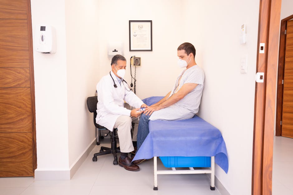 Friendly doctor during a warm consultation with a patient
